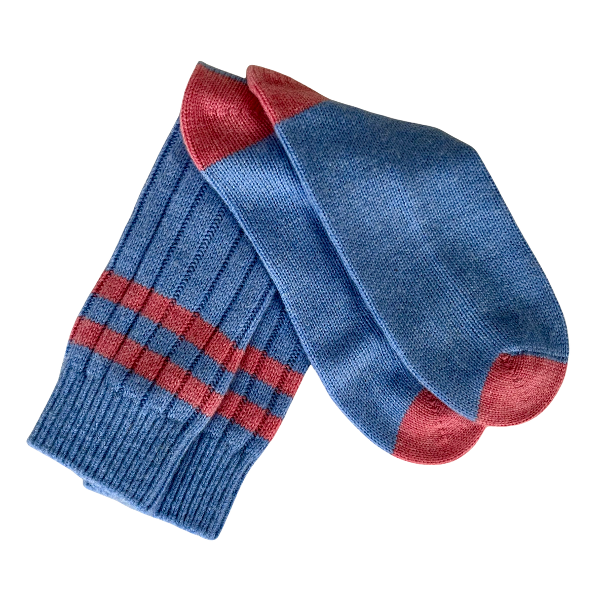 A pair of blue knit cashmere socks with pink accents on the toes & heels, and two horizontal pink stripes near the cuff, shown against a plain white background.