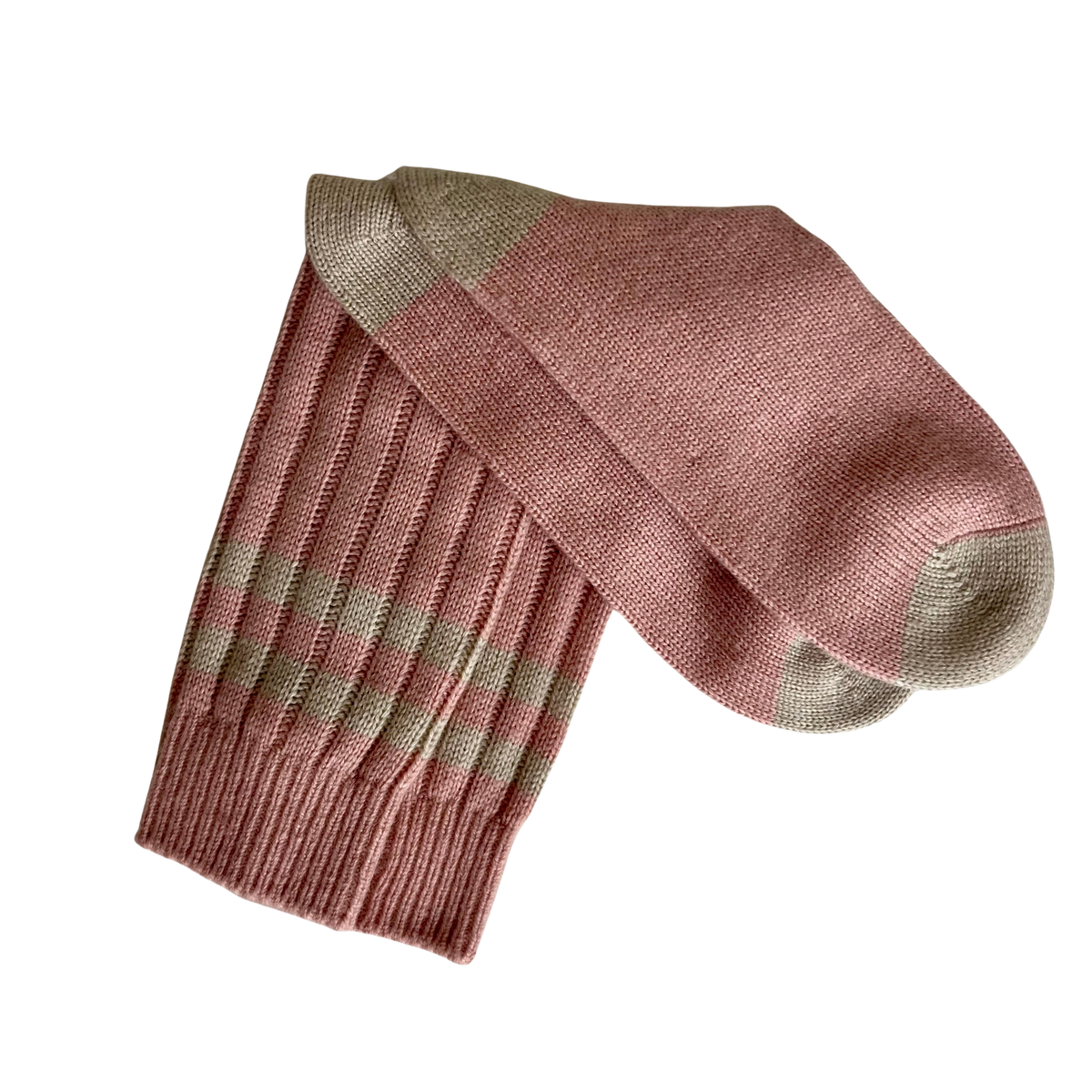 A pair of ribbed knit cashmere socks in dusty rose pink with muted cream stripes and matching toe/heel sections, shown on a plain white background.