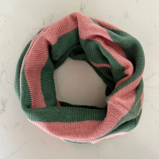 A pretty soft sea green and corally pink striped Saddle Creek 100% cashmere snood which is reversible and approx 16" long and 10" wide. The reverse is  a plain sea green colour. Can be worn either way to keep your neck cosy warm